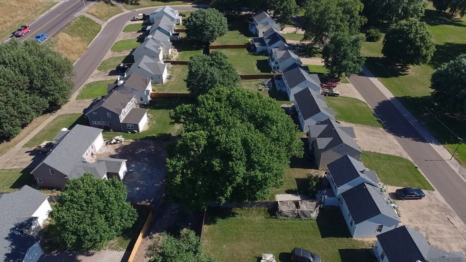Aerial view of a residential neighborhood of single-family homes and duplexes in Sioux Falls, South Dakota